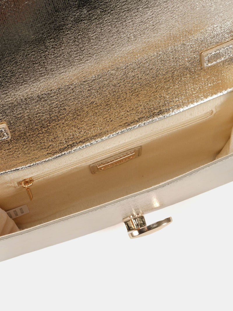 Novo gold clutch bag with twist hardware closure (British brand)