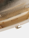 Novo gold clutch bag with twist hardware closure (British brand)