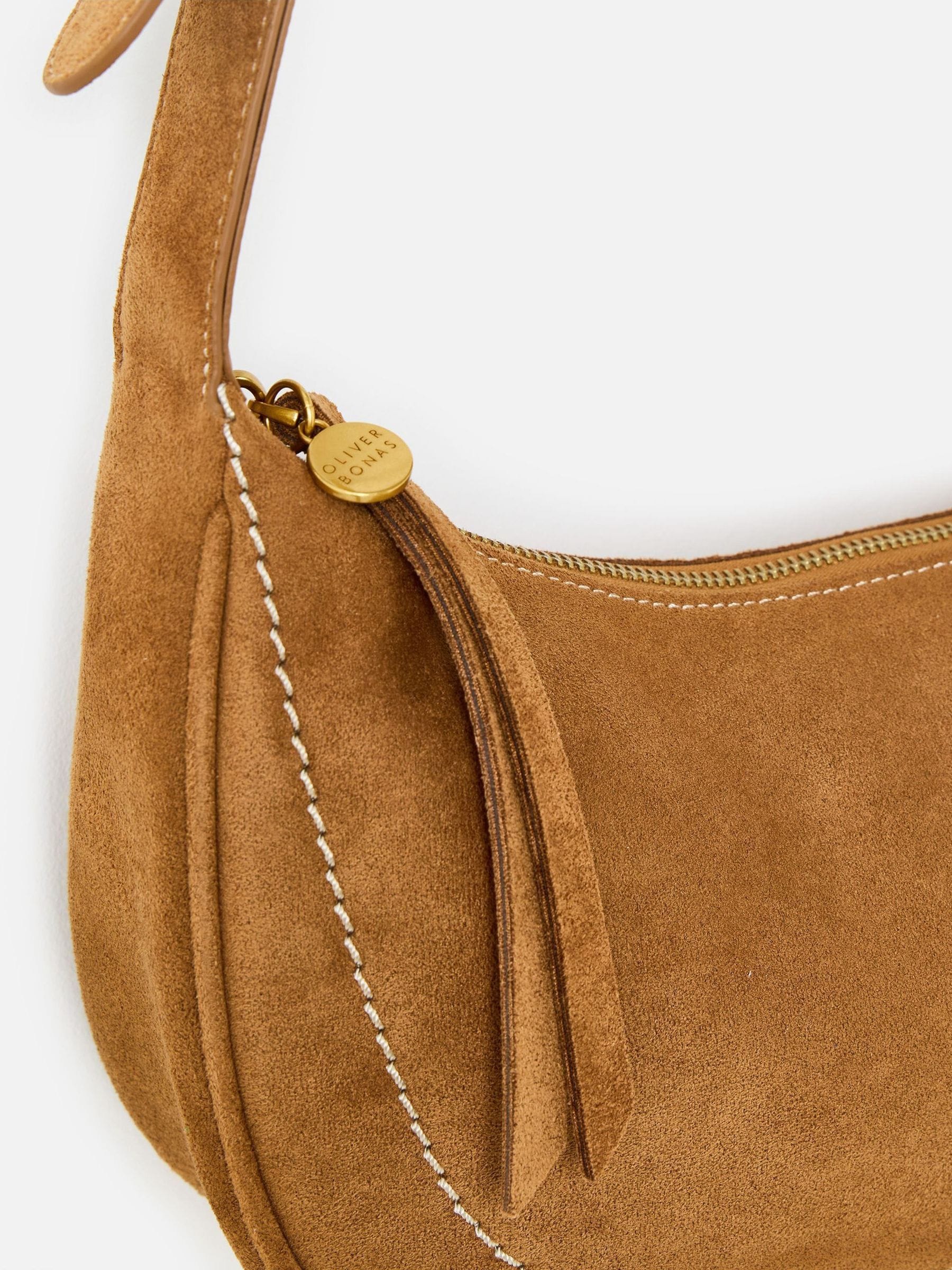 Oliver Bonas Ida tan faux suede sling crossbody bag, UK version