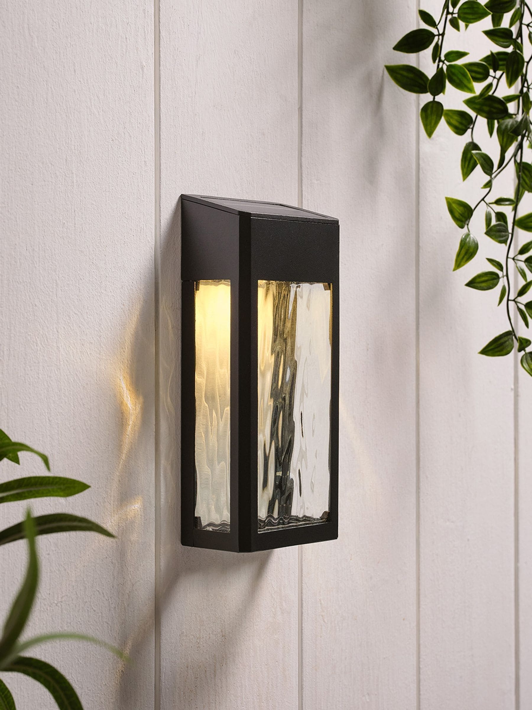 Lights4fun black glass solar wall light - British product