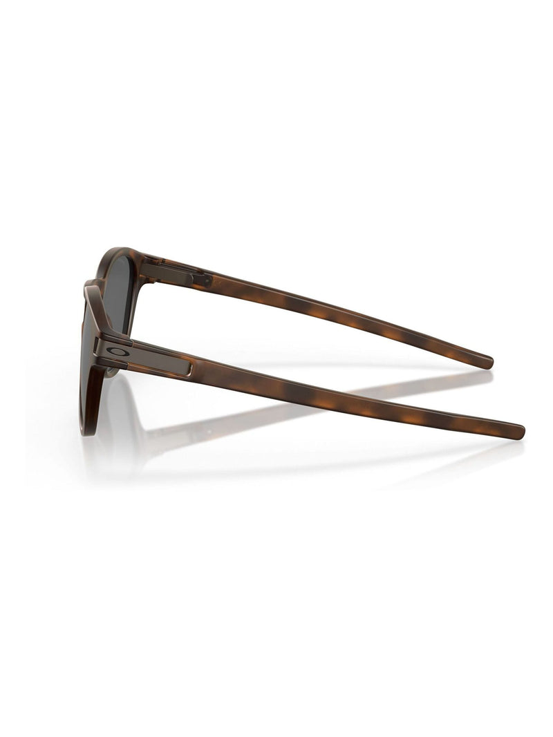 Oakley Latch Oval sunglasses brown tortoise Prizm Black, imported from the UK
