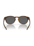 Oakley Latch Oval sunglasses brown tortoise Prizm Black, imported from the UK