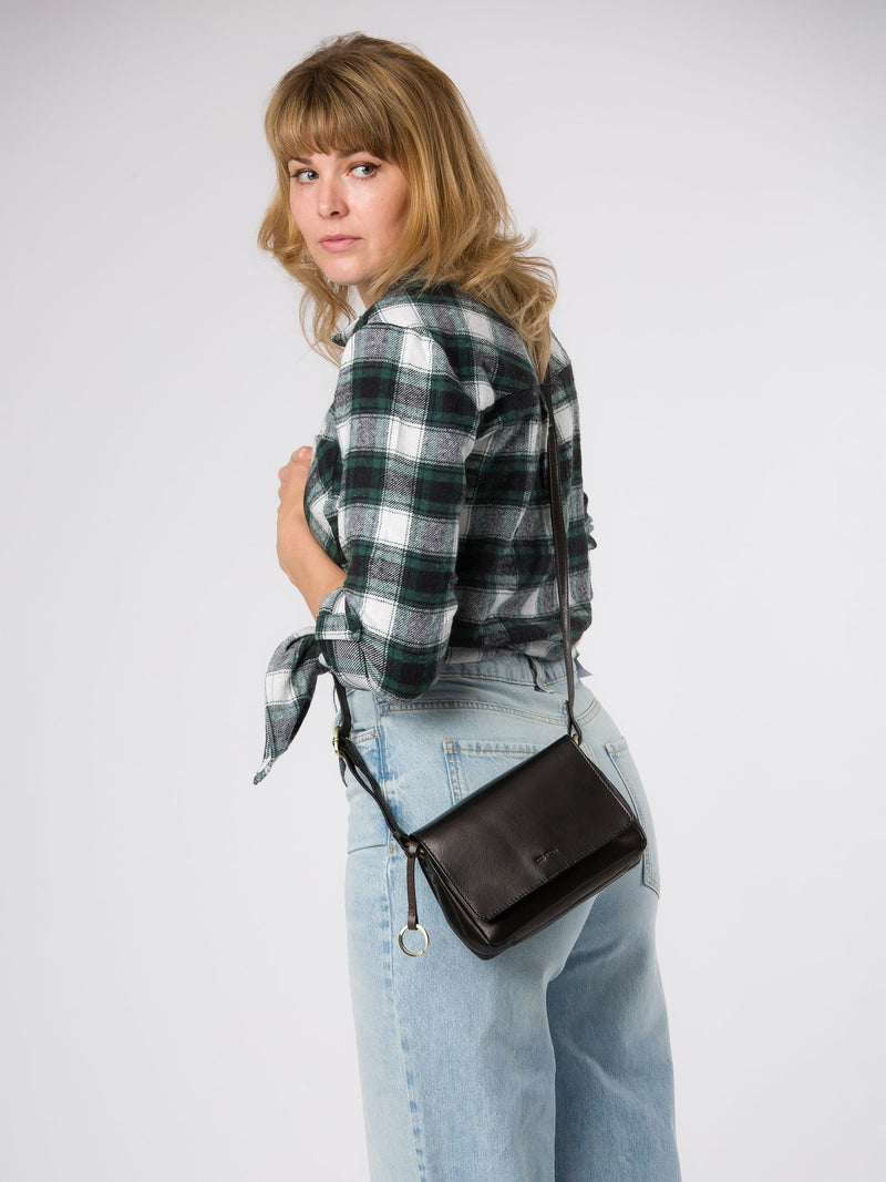 Conkca Cosima cross-body bag in black leather, imported from the UK