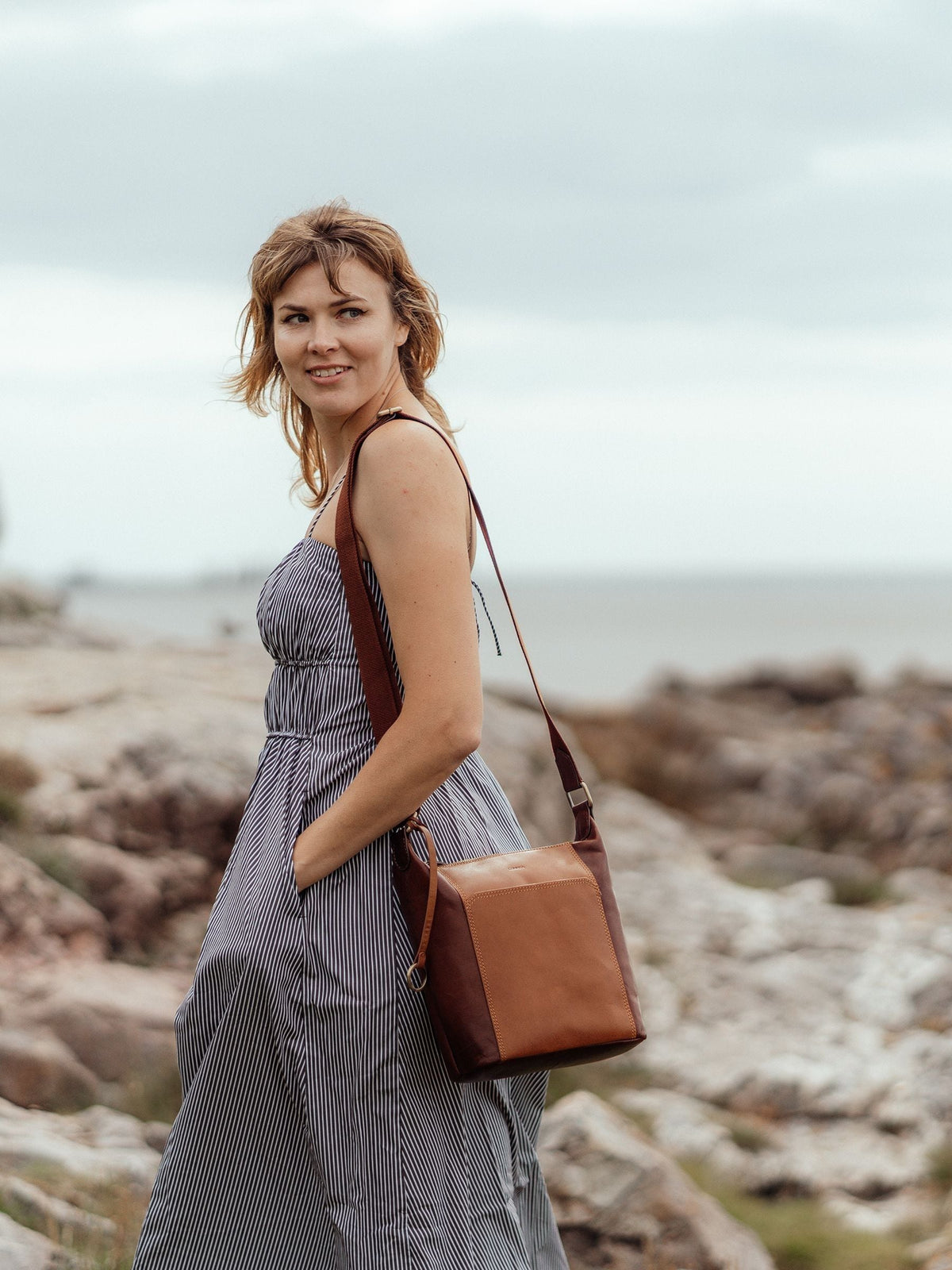 Conkca multi-toned brown leather shoulder bag with adjustable strap, UK version