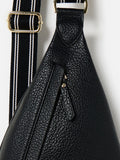 Oliver Bonas black belt bag with gold hardware, imported from the UK
