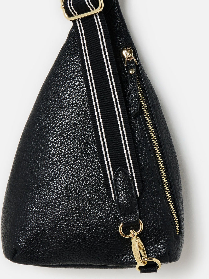 Oliver Bonas black belt bag with gold hardware, imported from the UK