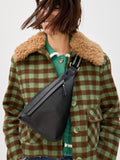 Oliver Bonas black belt bag with gold hardware, imported from the UK