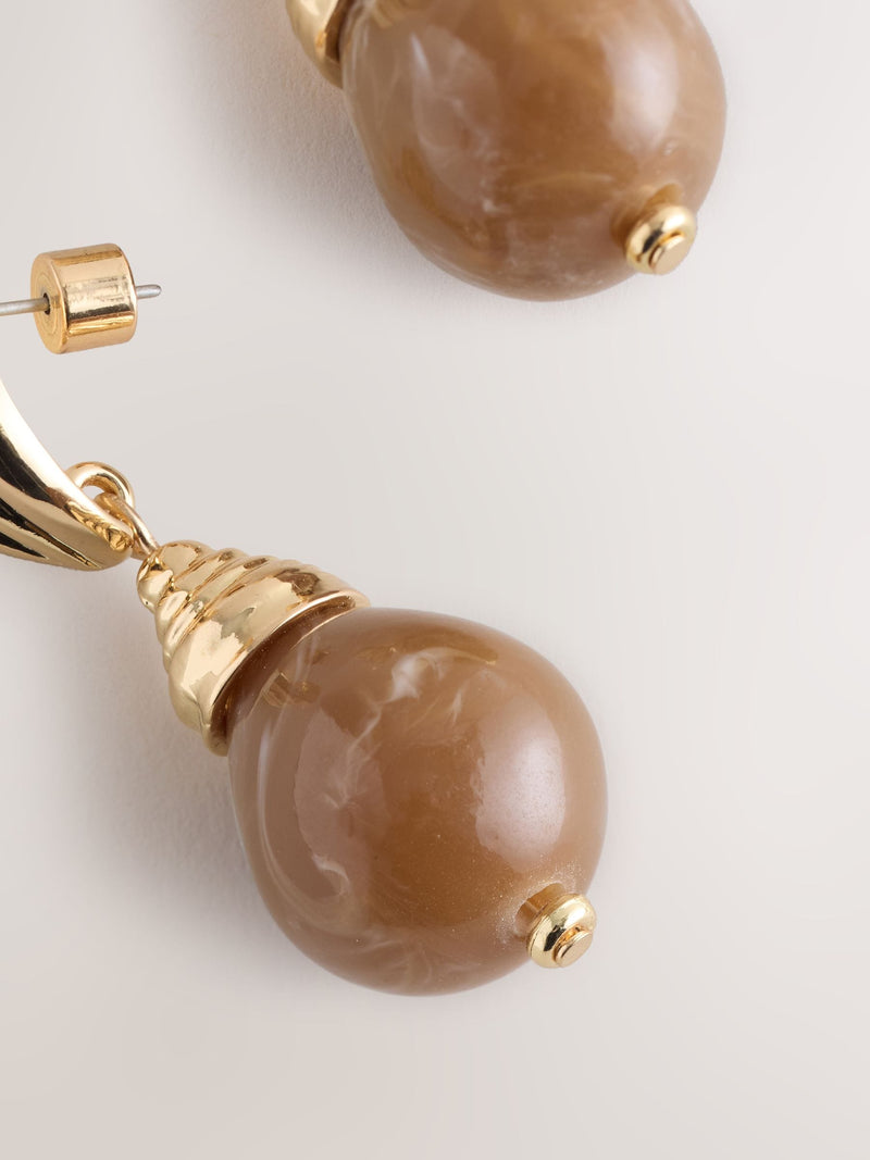 Brown resin drop earrings, UK version
