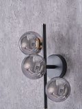 Pacific Smoke Blair glass ball metal wall light, UK version