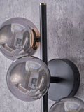 Pacific Smoke Blair glass ball metal wall light, UK version