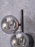 Pacific Smoke Blair glass ball metal wall light, UK version