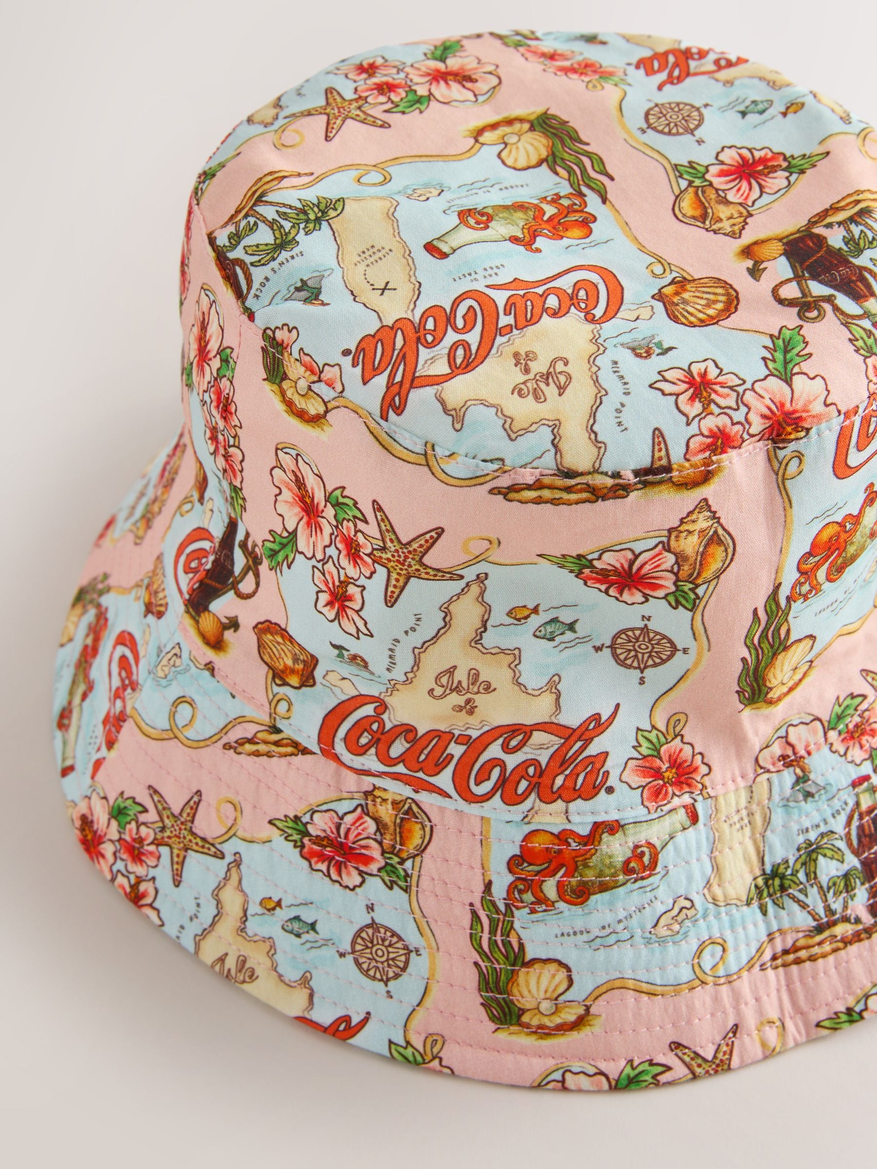 Coca Cola licensed map print bucket hat, imported from the UK
