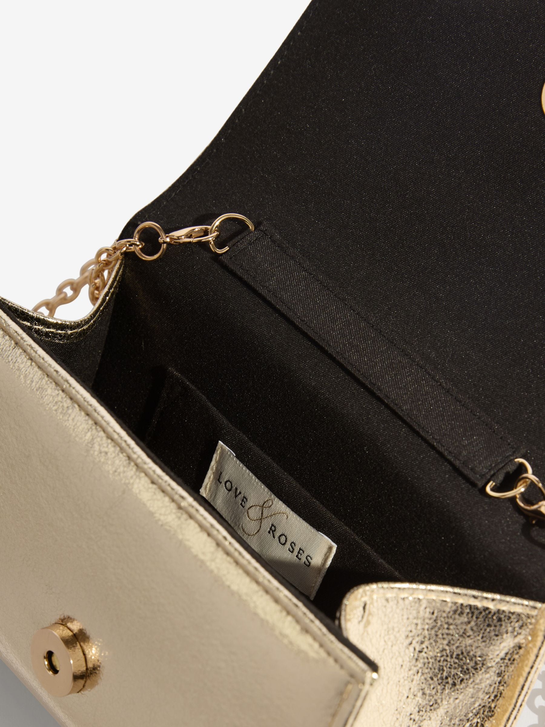 Love & Roses gold tassel clutch bag, imported from the UK