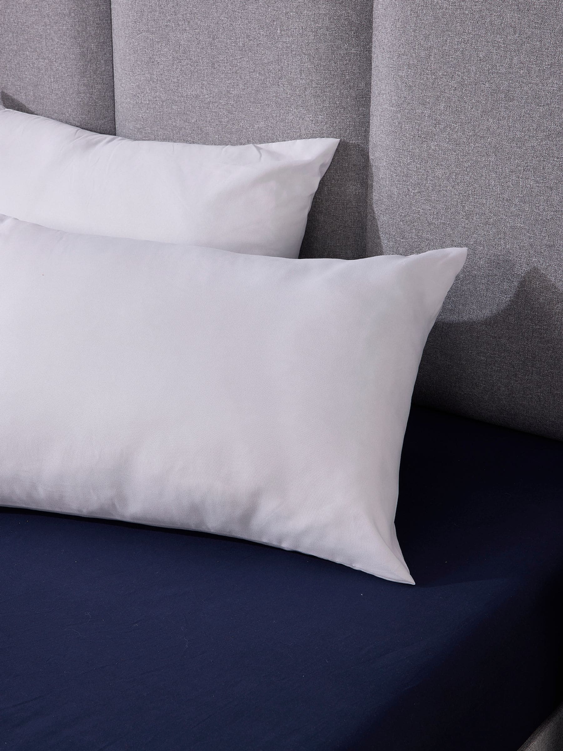 Downland Sleep Well Pillow Pair with hollowfibre filling, imported from the UK