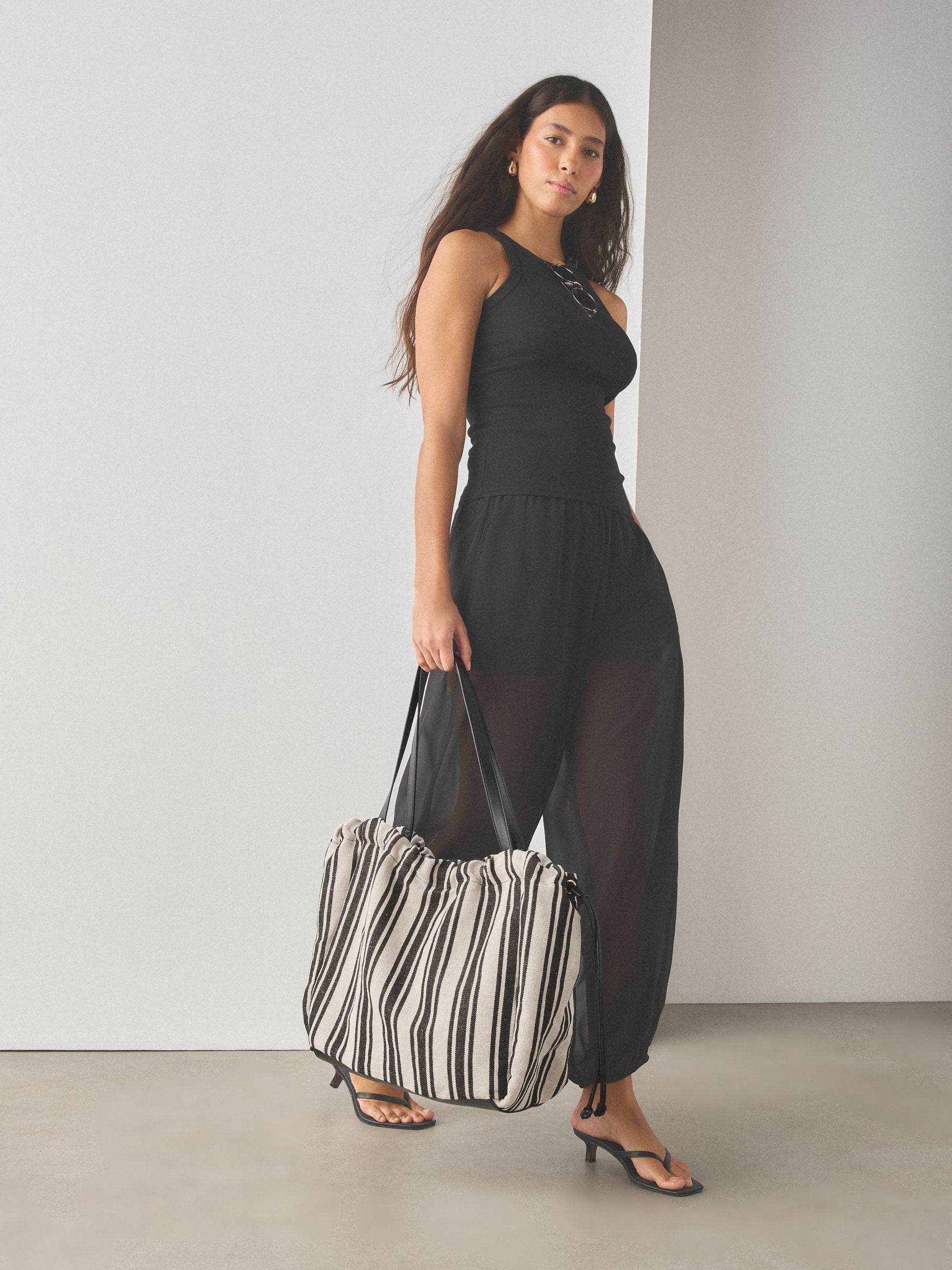 Black and white stripe drawstring shoulder bag, imported from the UK
