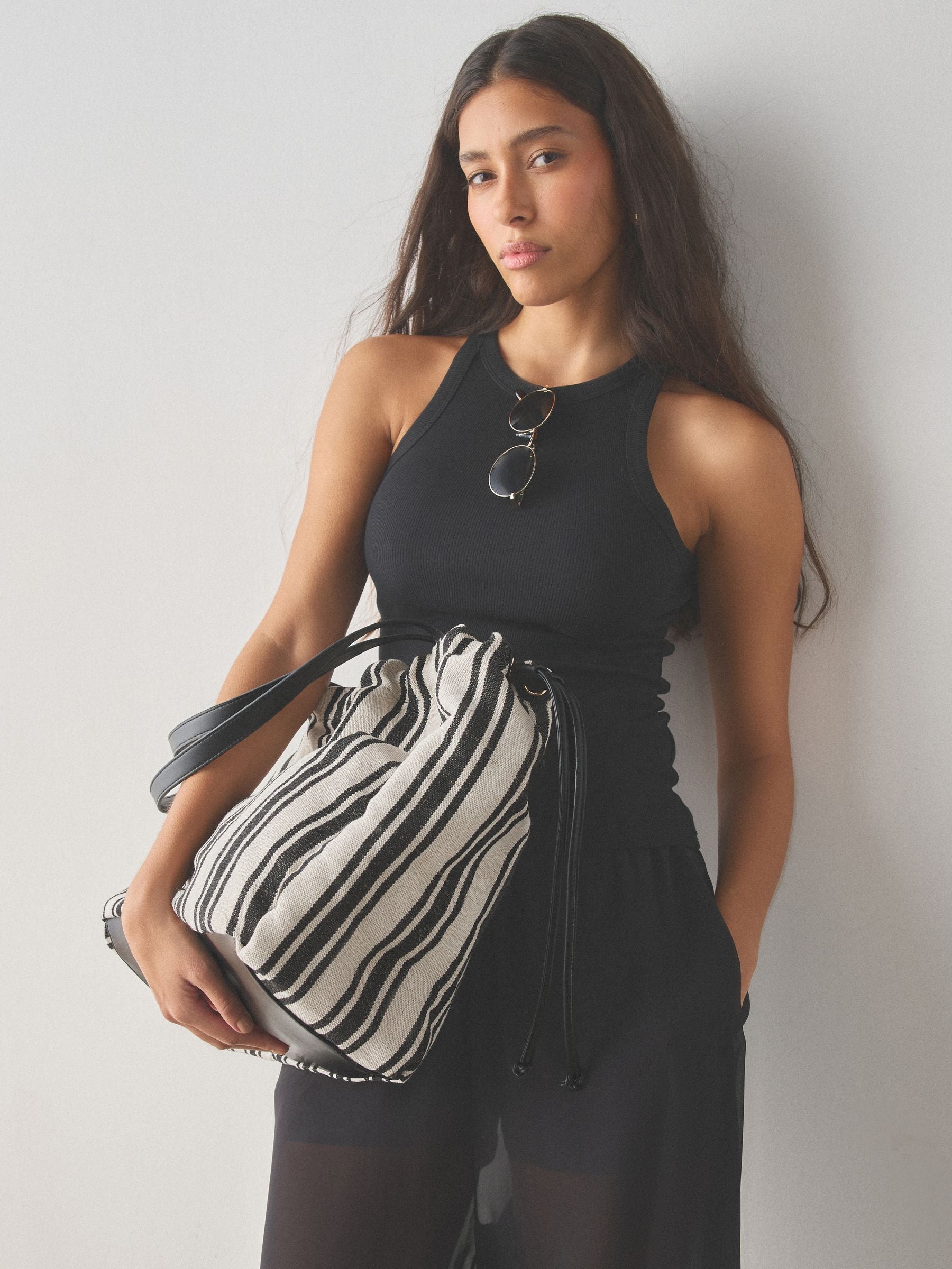 Black and white stripe drawstring shoulder bag, imported from the UK