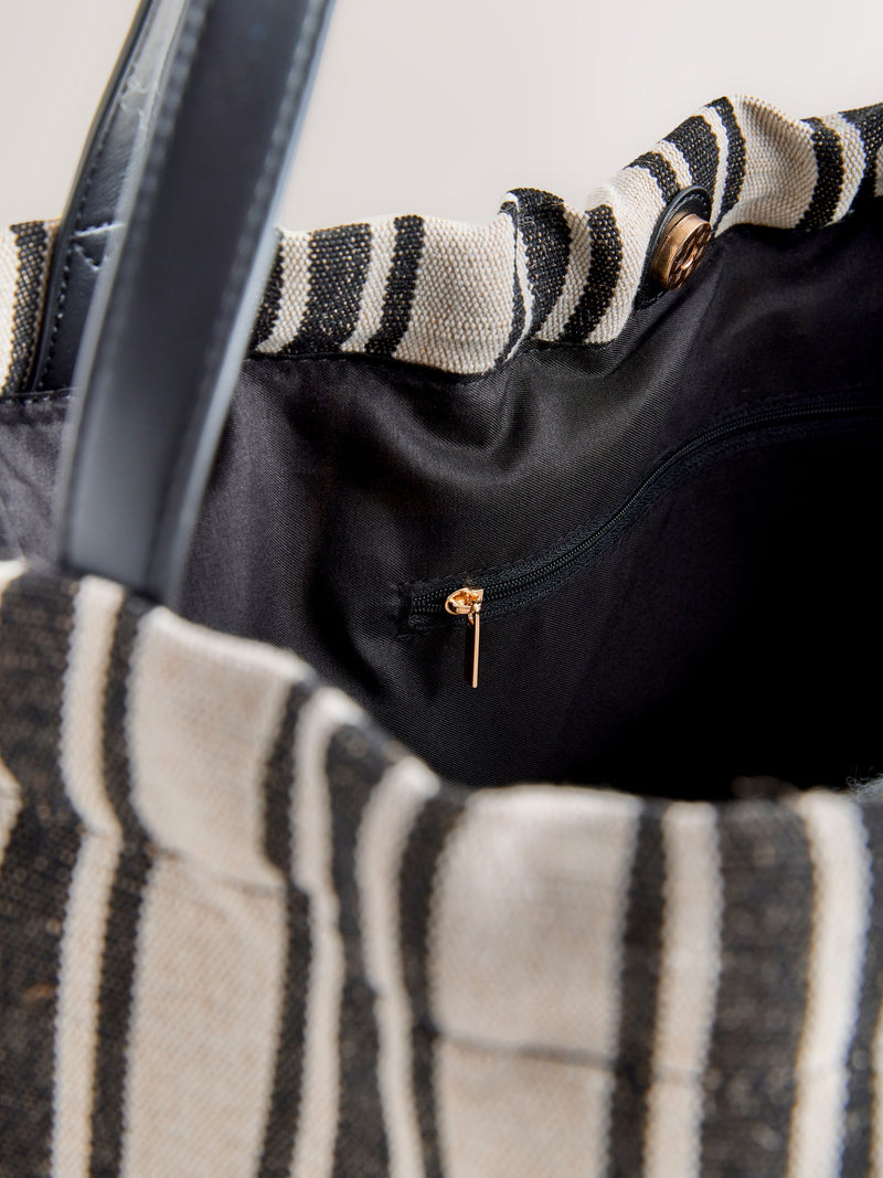 Black and white stripe drawstring shoulder bag, imported from the UK