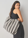 Black and white stripe drawstring shoulder bag, imported from the UK