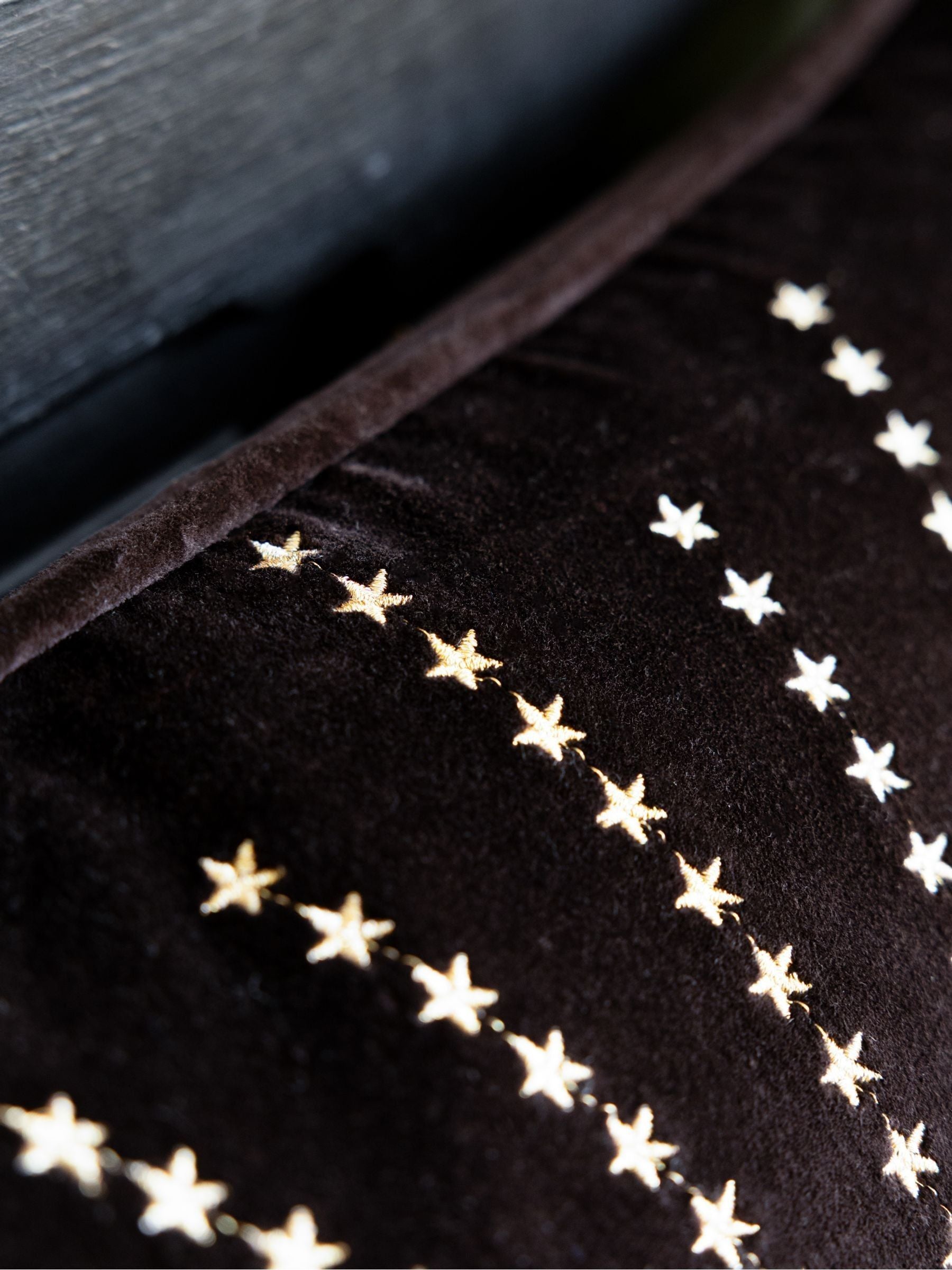 Rockett St George black embroidered starburst cotton velvet cushion 50cm, imported from the UK