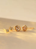 Carrie Elizabeth Gold Tone Dainty Blue Topaz Star Stud Earrings