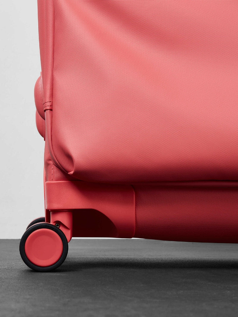 Rock Luggage Juniper medium suitcase in coral orange, UK version