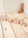 Personalised Flopsy Bunny pull-along train by My 1st Years, imported from the UK