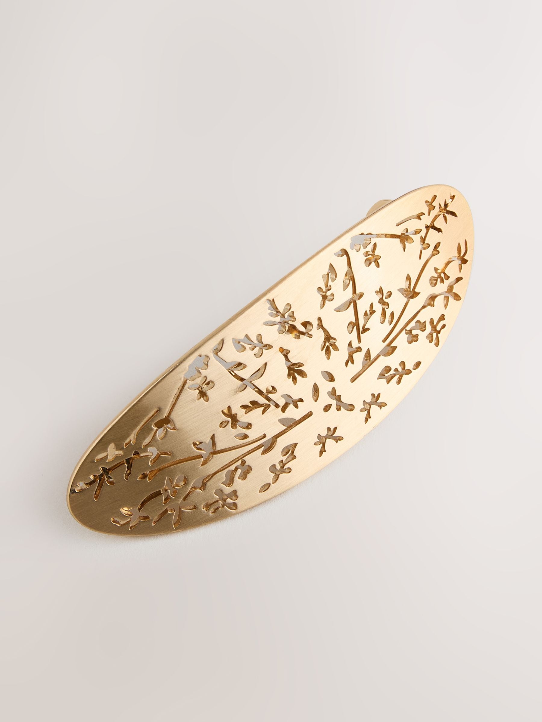 Gold tone floral hair barrette, imported from the UK
