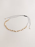 Gold tone chunky beaded cord adjustable necklace, UK version