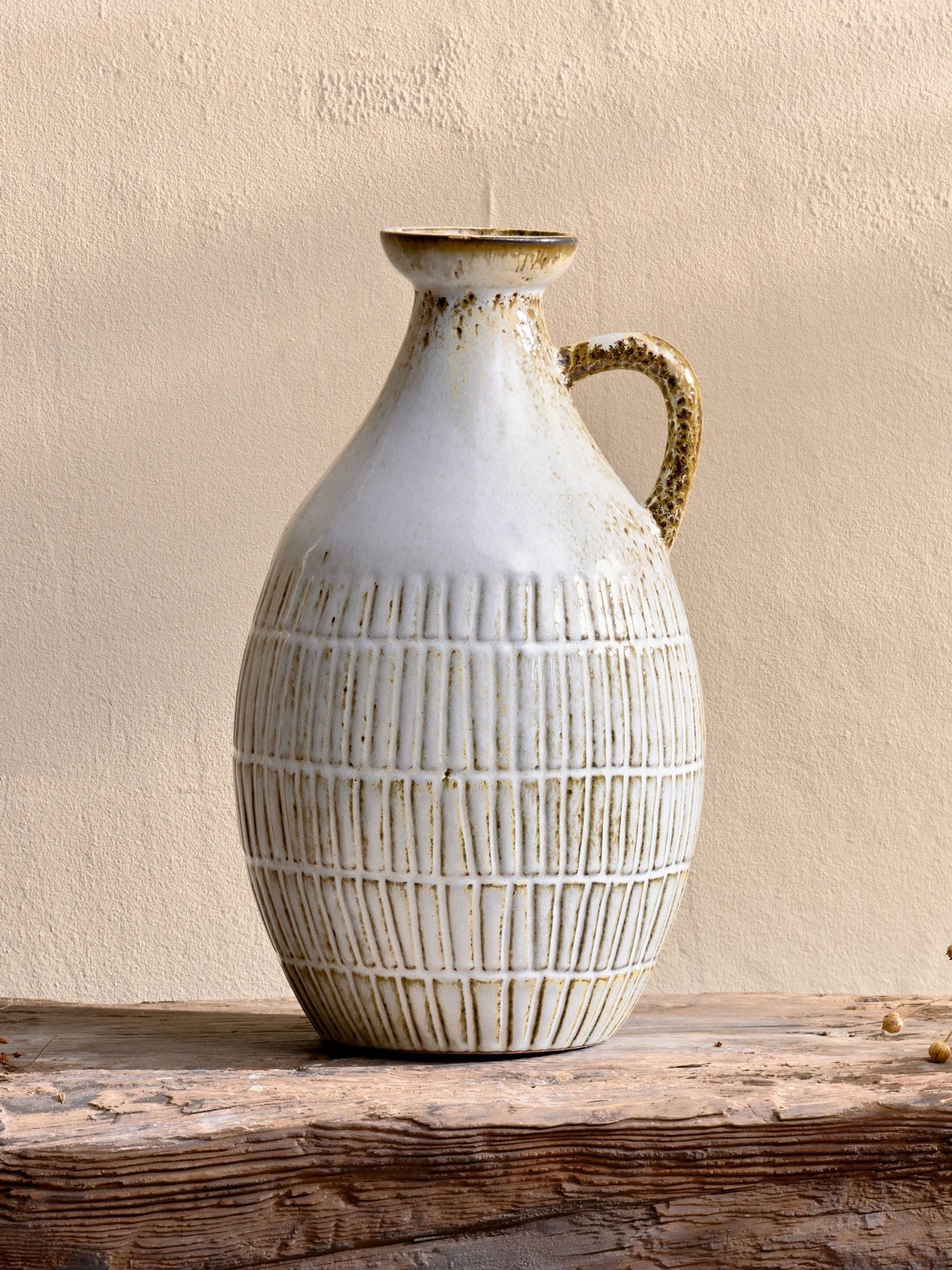 Nkuku White Anjuna reactive glaze decorative jug, UK version