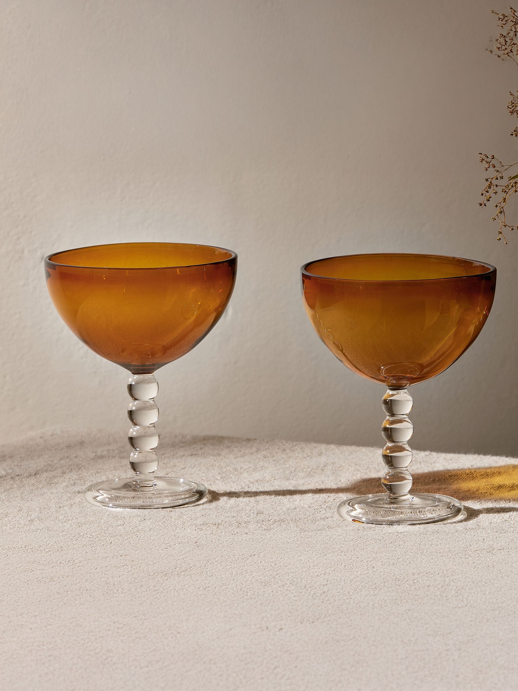 Nkuku set of 4 amber champagne coupe glasses (British brand)