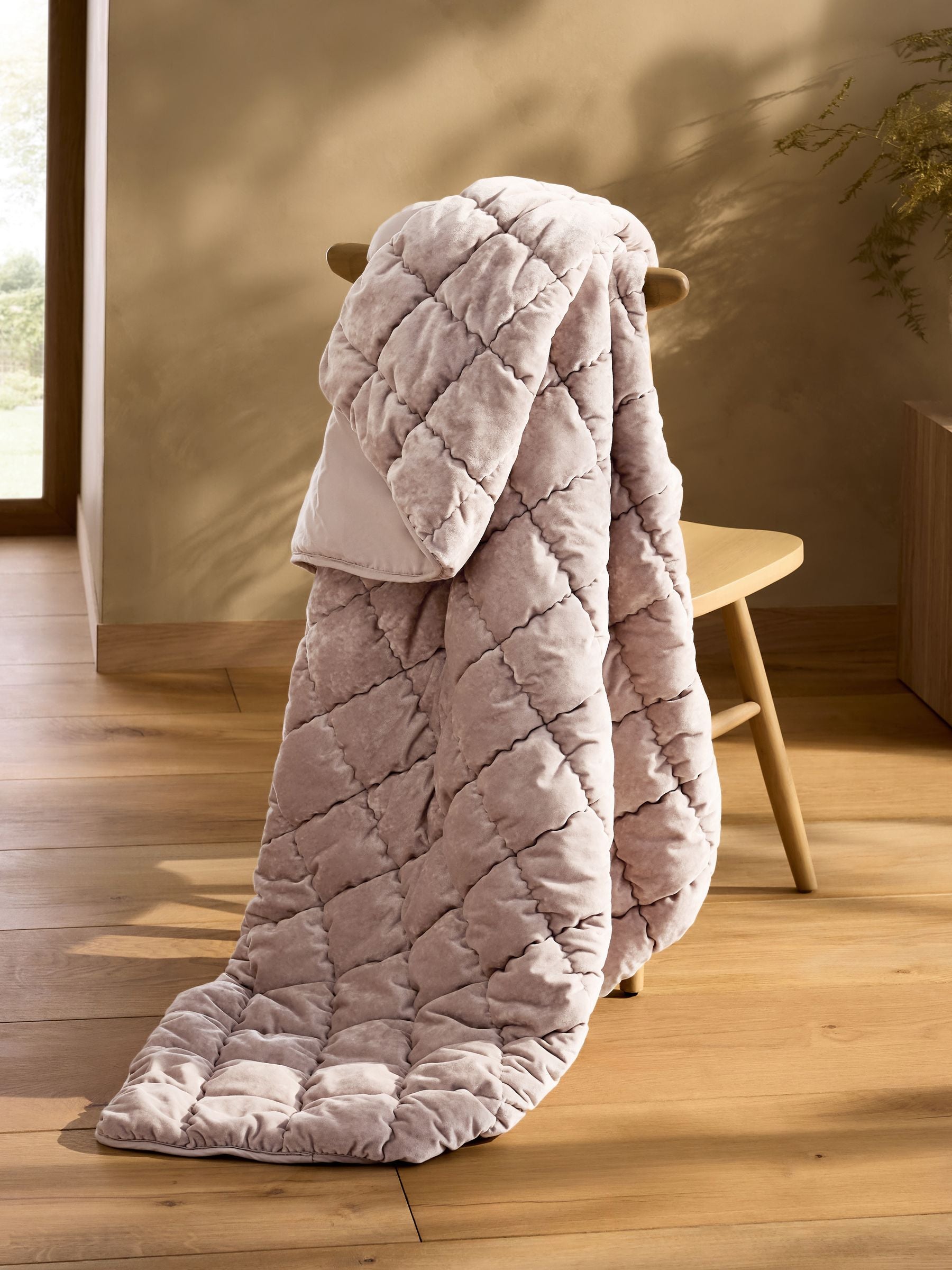 Natural Darcie quilted bedspread in champagne velvet (British brand)