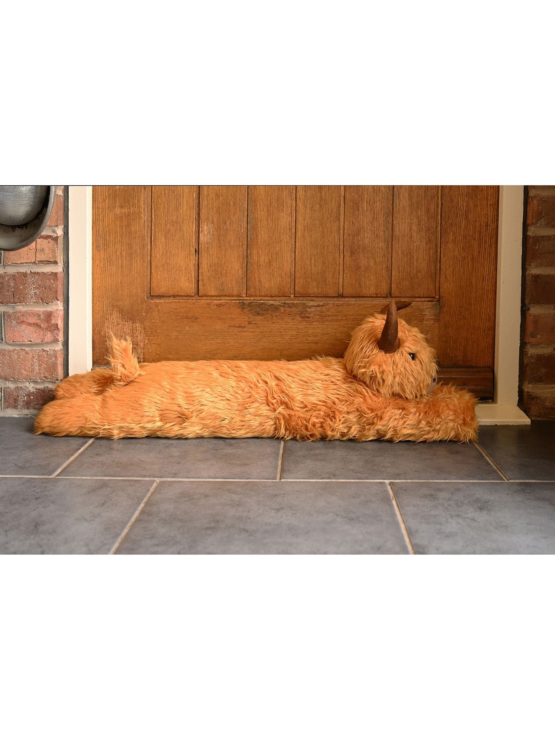 Country Living Brown Highland Cow draught excluder 78cm, UK version