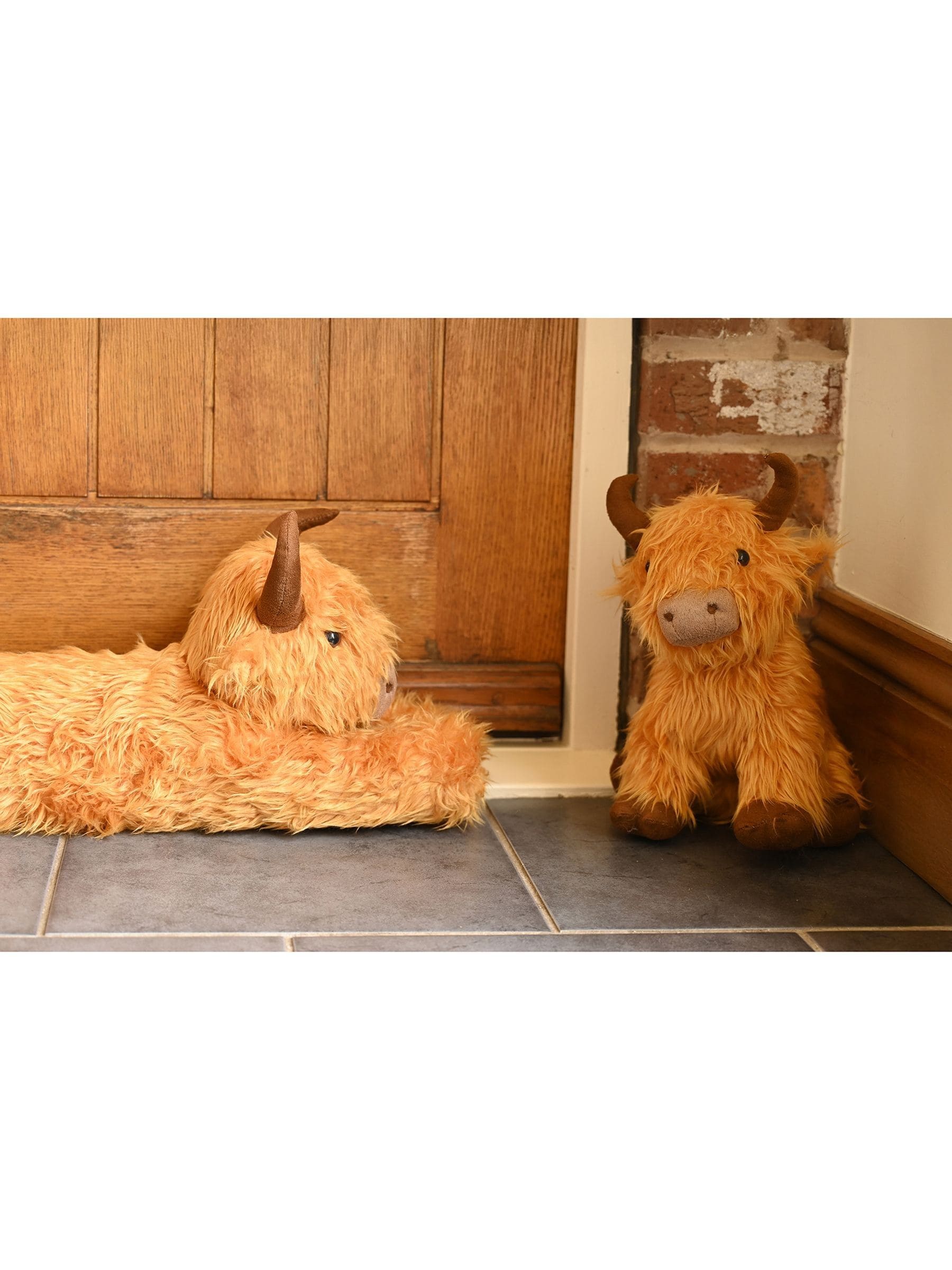 Country Living Brown Highland Cow draught excluder 78cm, UK version