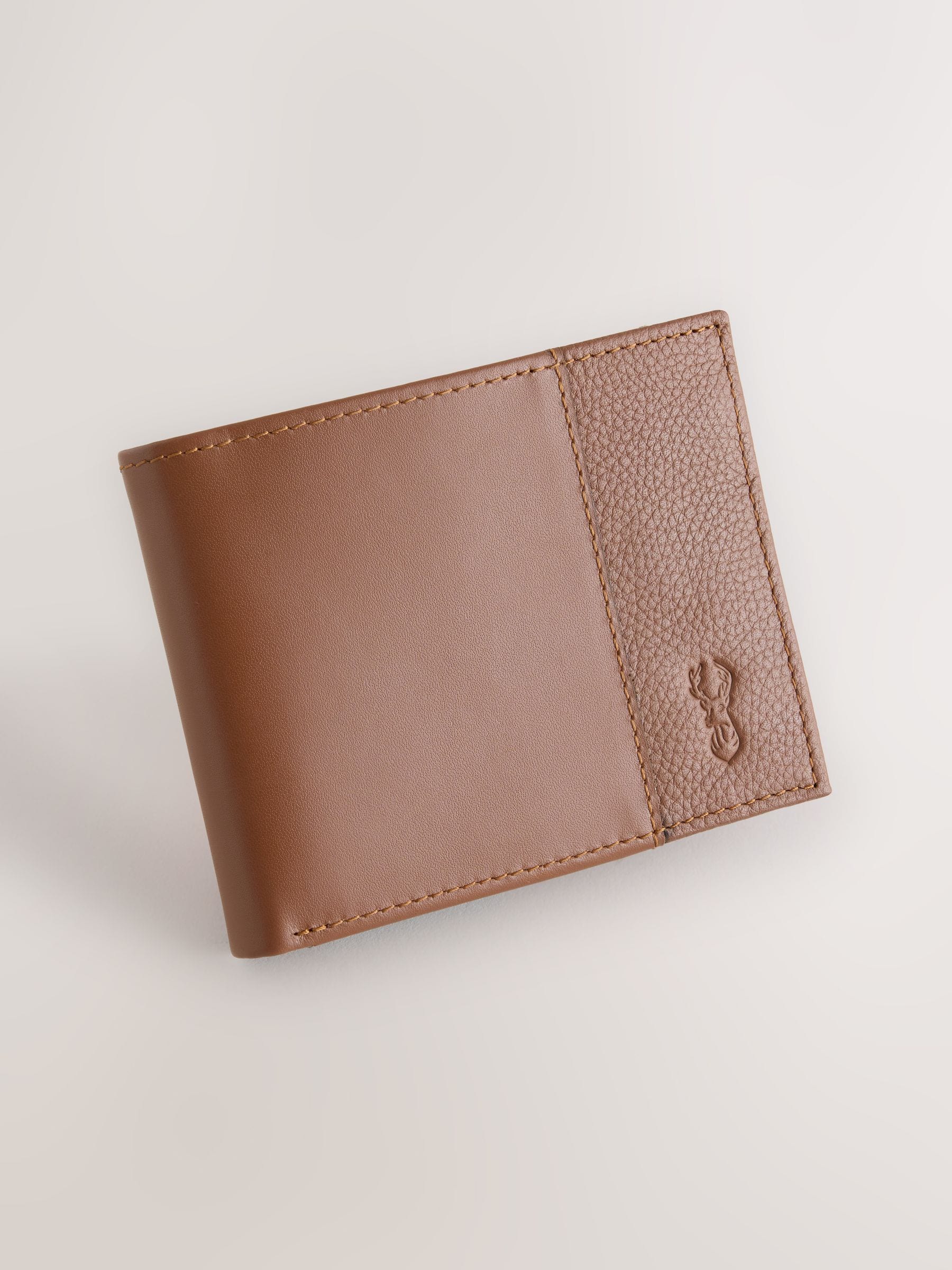 Tan brown leather bifold wallet with stag embossing (British brand)