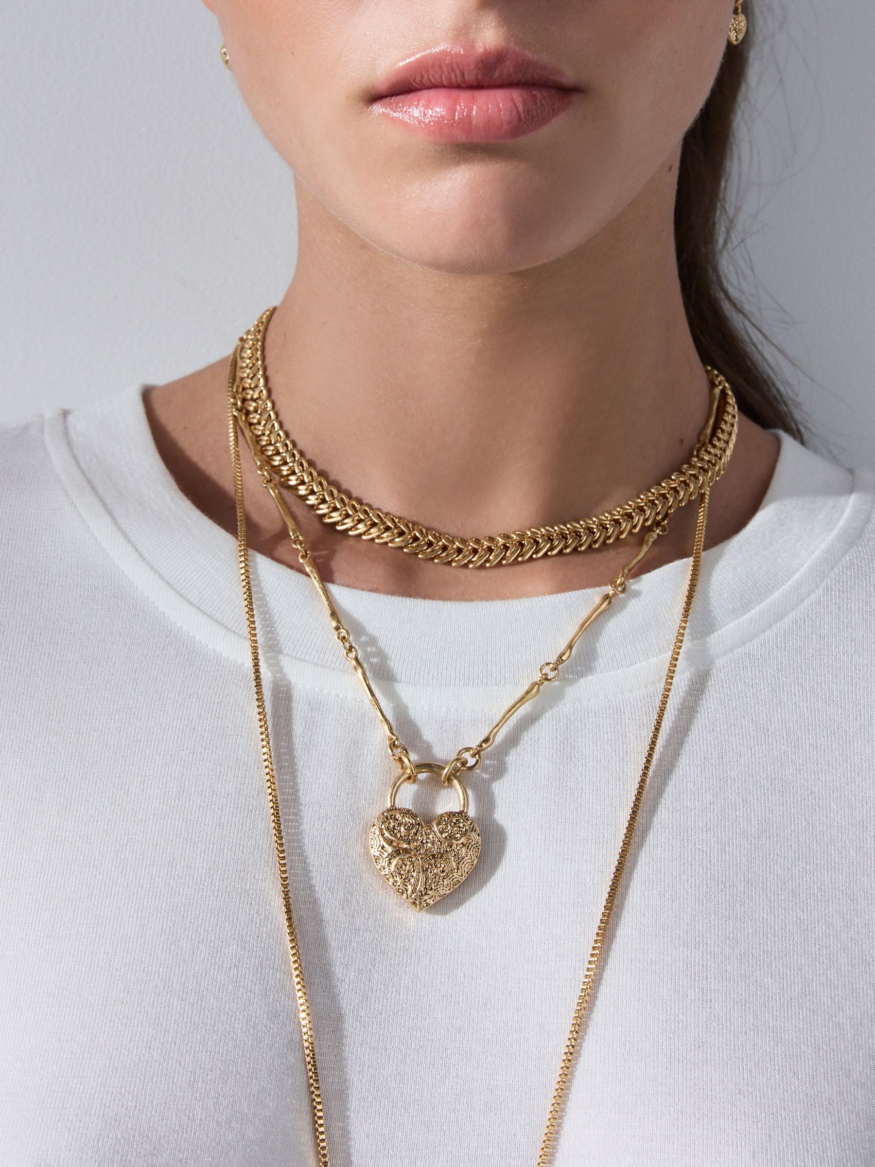 Tabitha Simmons gold tone layered charm necklace, imported from the UK