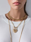 Tabitha Simmons gold tone layered charm necklace, imported from the UK