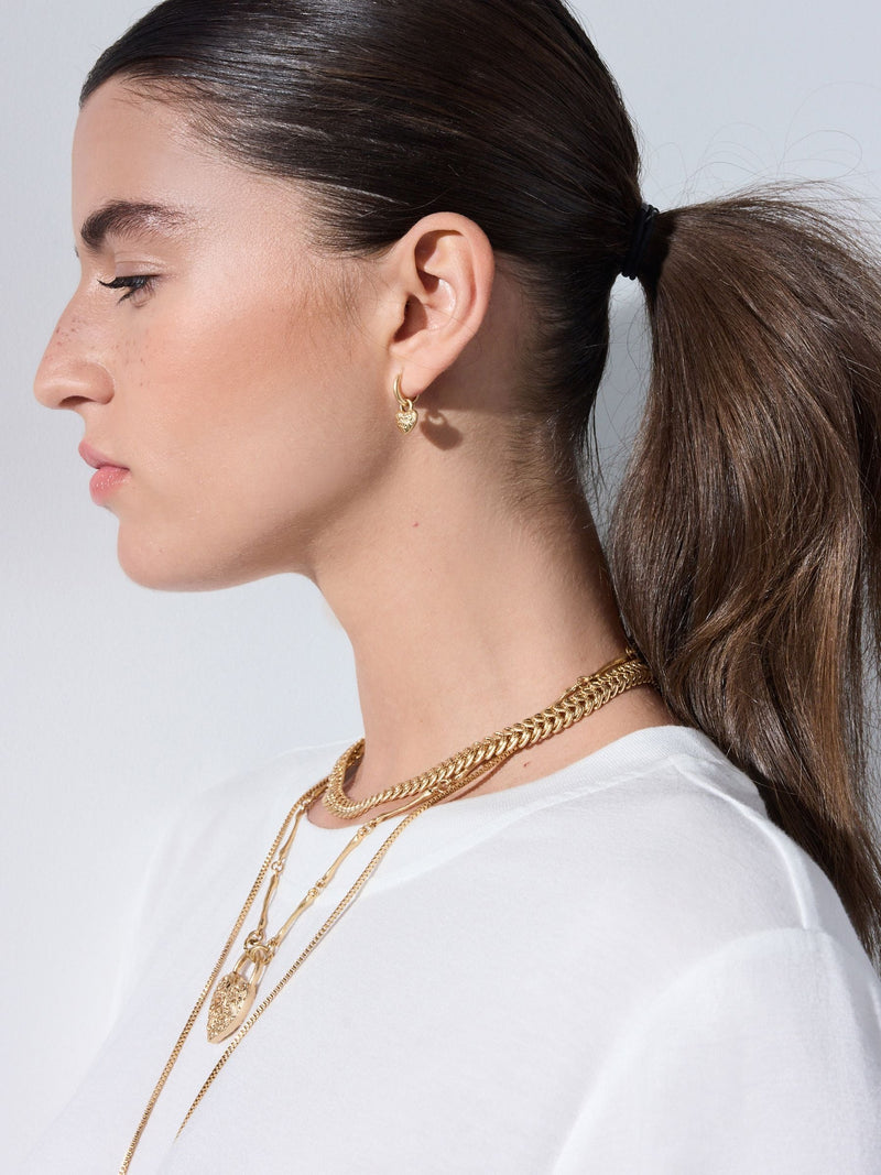 Tabitha Simmons gold tone layered charm necklace, imported from the UK