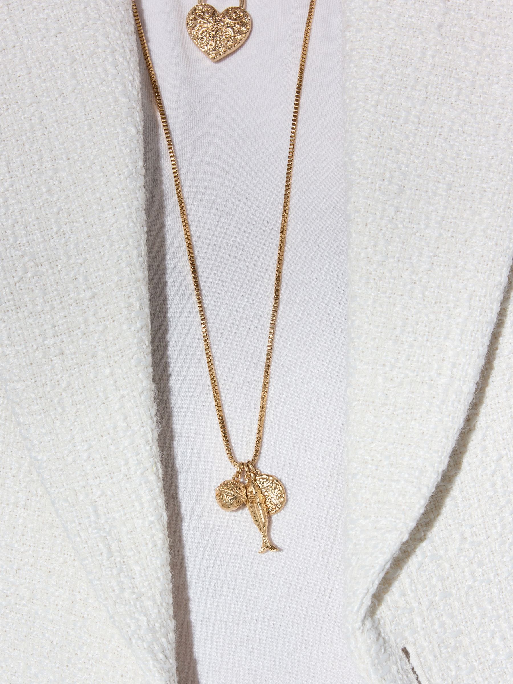 Tabitha Simmons gold tone layered charm necklace, imported from the UK
