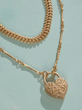 Tabitha Simmons gold tone layered charm necklace, imported from the UK