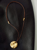 Reiss gold tone Orla large cord pendant necklace 4cm, UK version