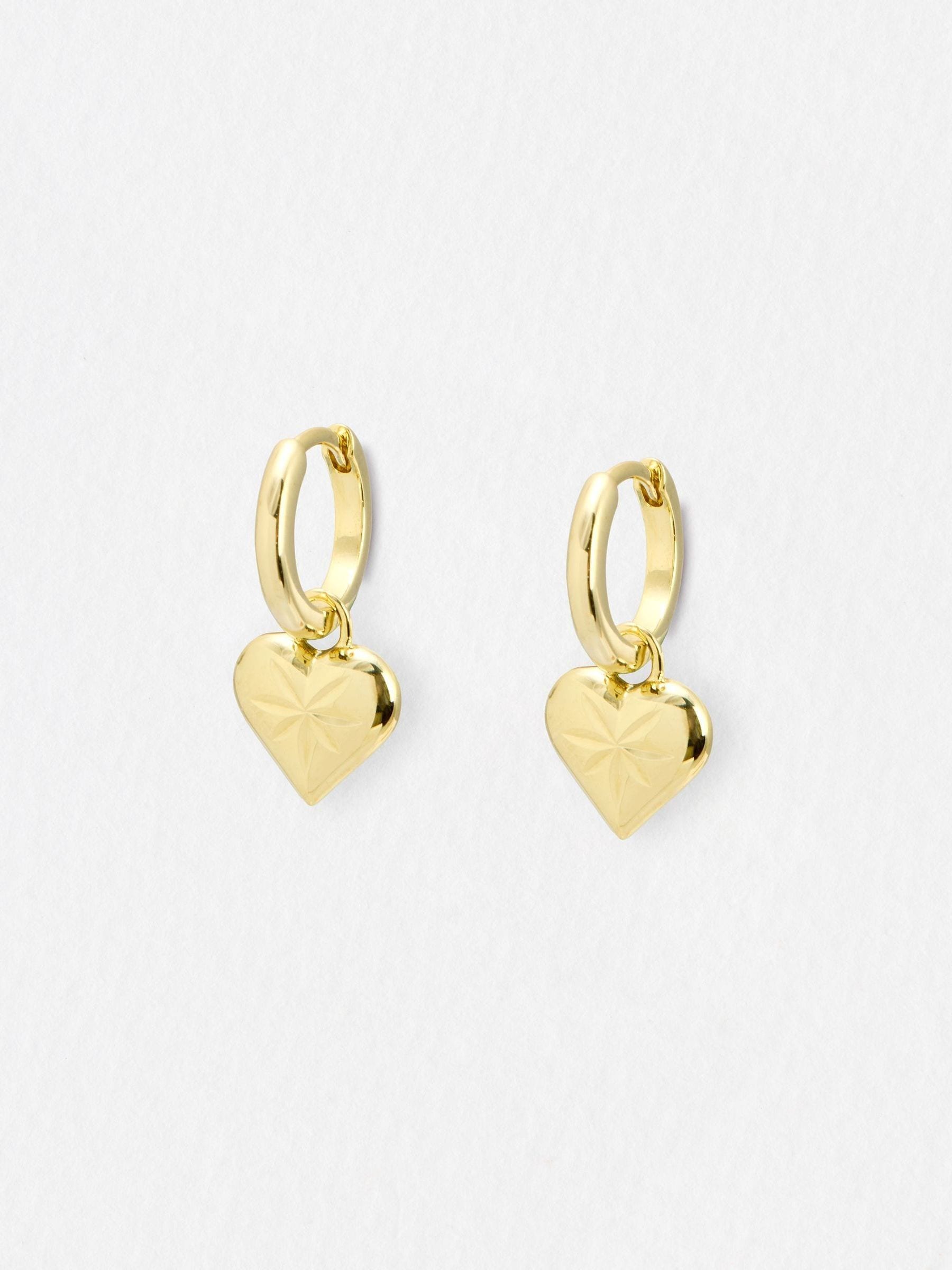 Oliver Bonas Cora engraved heart charm hoop drop earrings, UK version