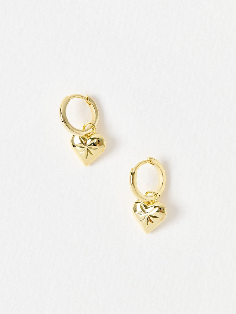 Oliver Bonas Cora engraved heart charm hoop drop earrings, UK version