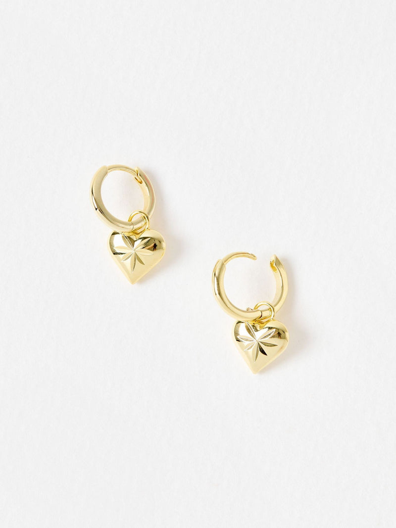 Oliver Bonas Cora engraved heart charm hoop drop earrings, UK version