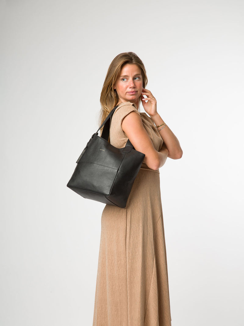 Pure Luxuries London black Fizz leather tote bag, imported from the UK