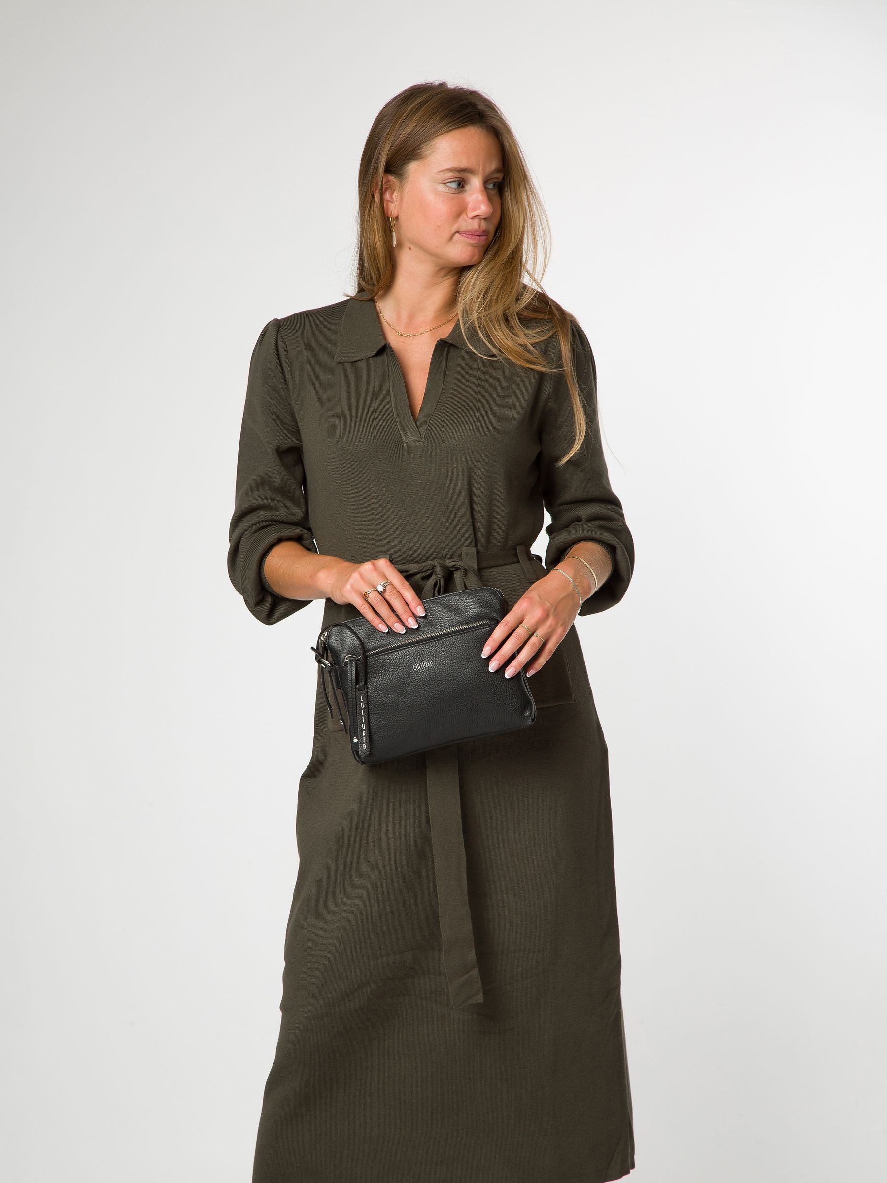 Cultured London black leather cross-body bag, imported from the UK