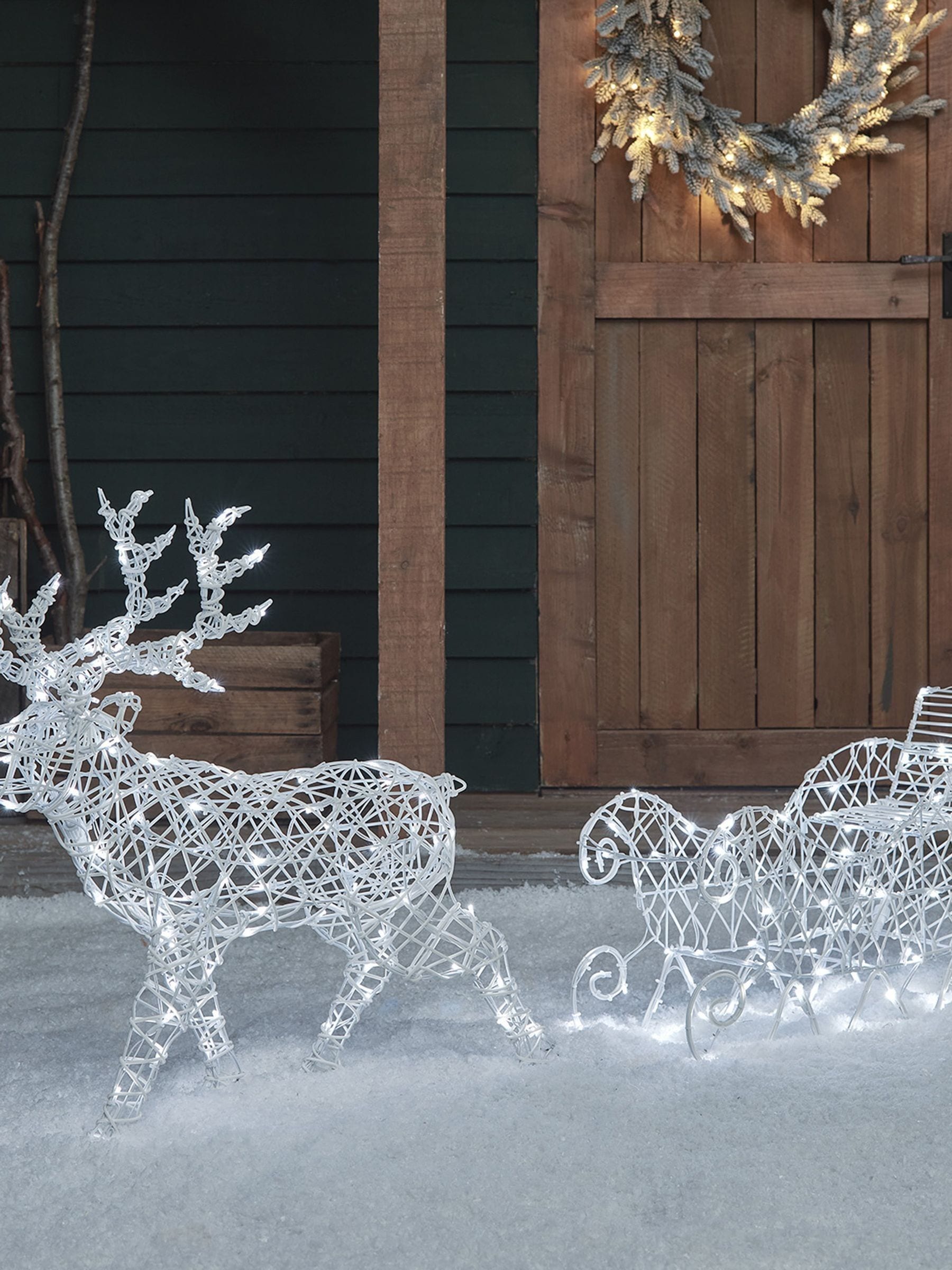 Lights4fun white rattan reindeer sleigh 70cm, imported from the UK