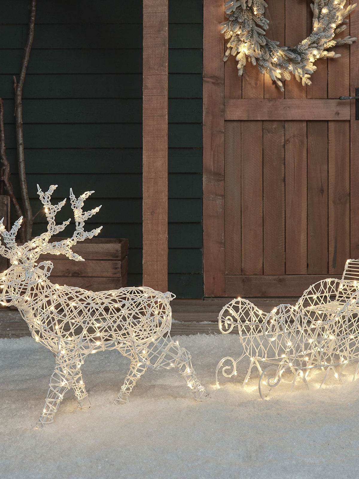 Lights4fun white rattan reindeer sleigh 70cm, imported from the UK
