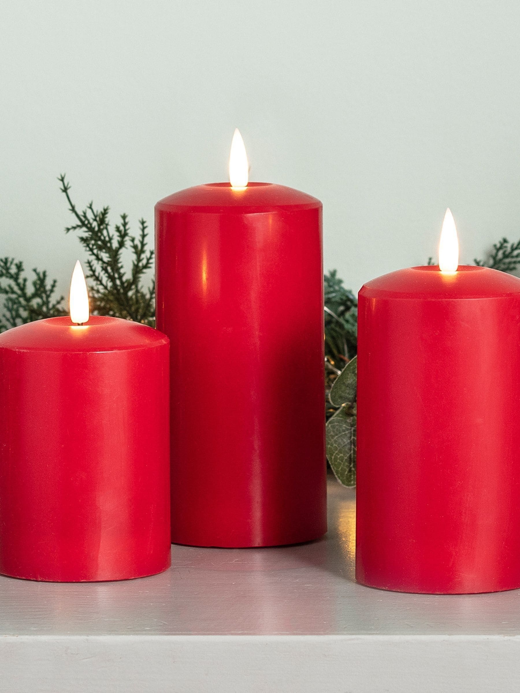 Lights4fun red TruGlow LED pillar candle trio (British brand)