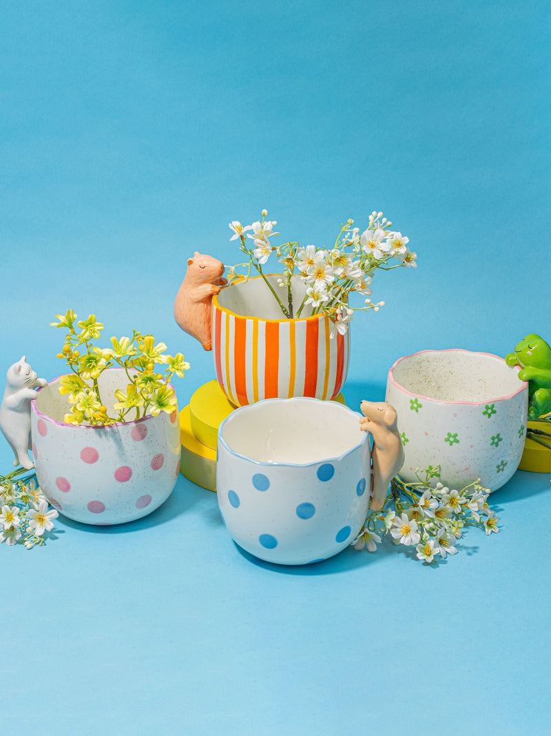 Sass & Belle orange peeking capybara planter, UK version