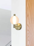 Searchlight satin brass frosted glass wall light, imported from the UK